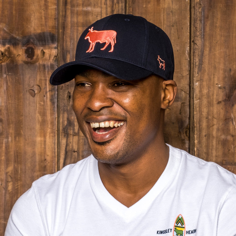 Kingsley Heath Outline Nguni Logo Midnight/Coral